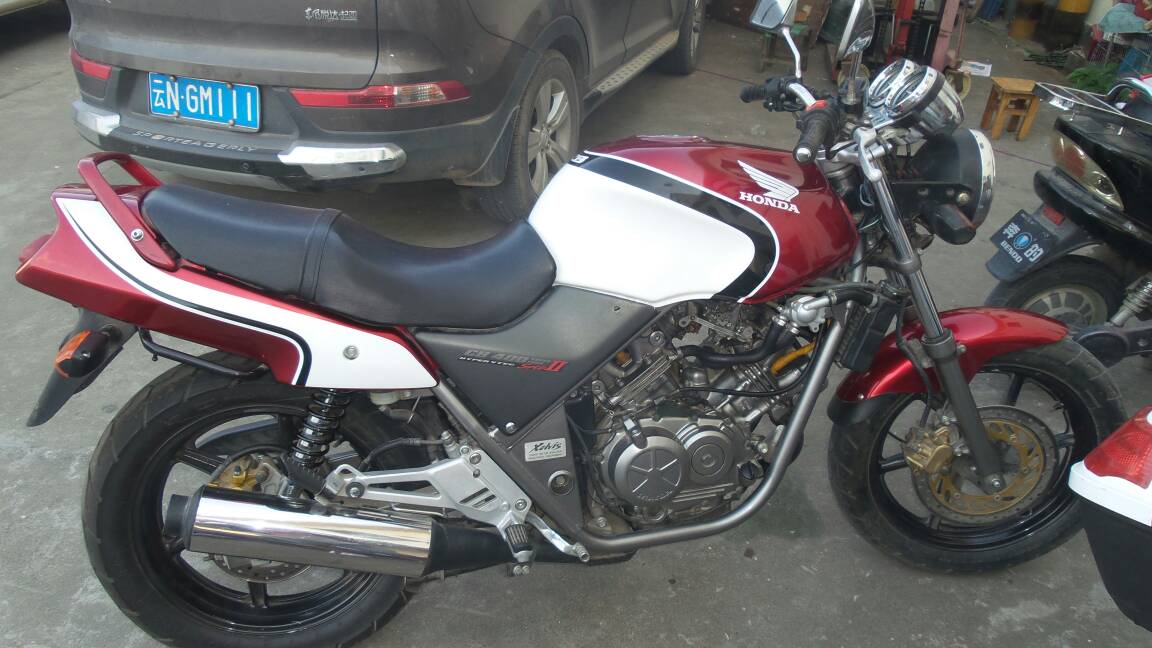 本田vt250骑着点火器就不点火了是怎么回事请各位大哥